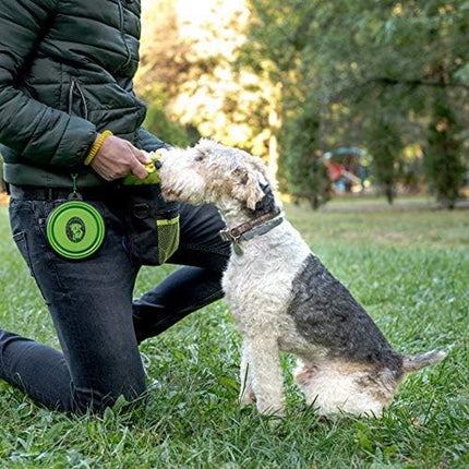 Premium dog treat pouch with clicker, collapsible bowl, adjustable straps, and belt clip for obedience and agility training.